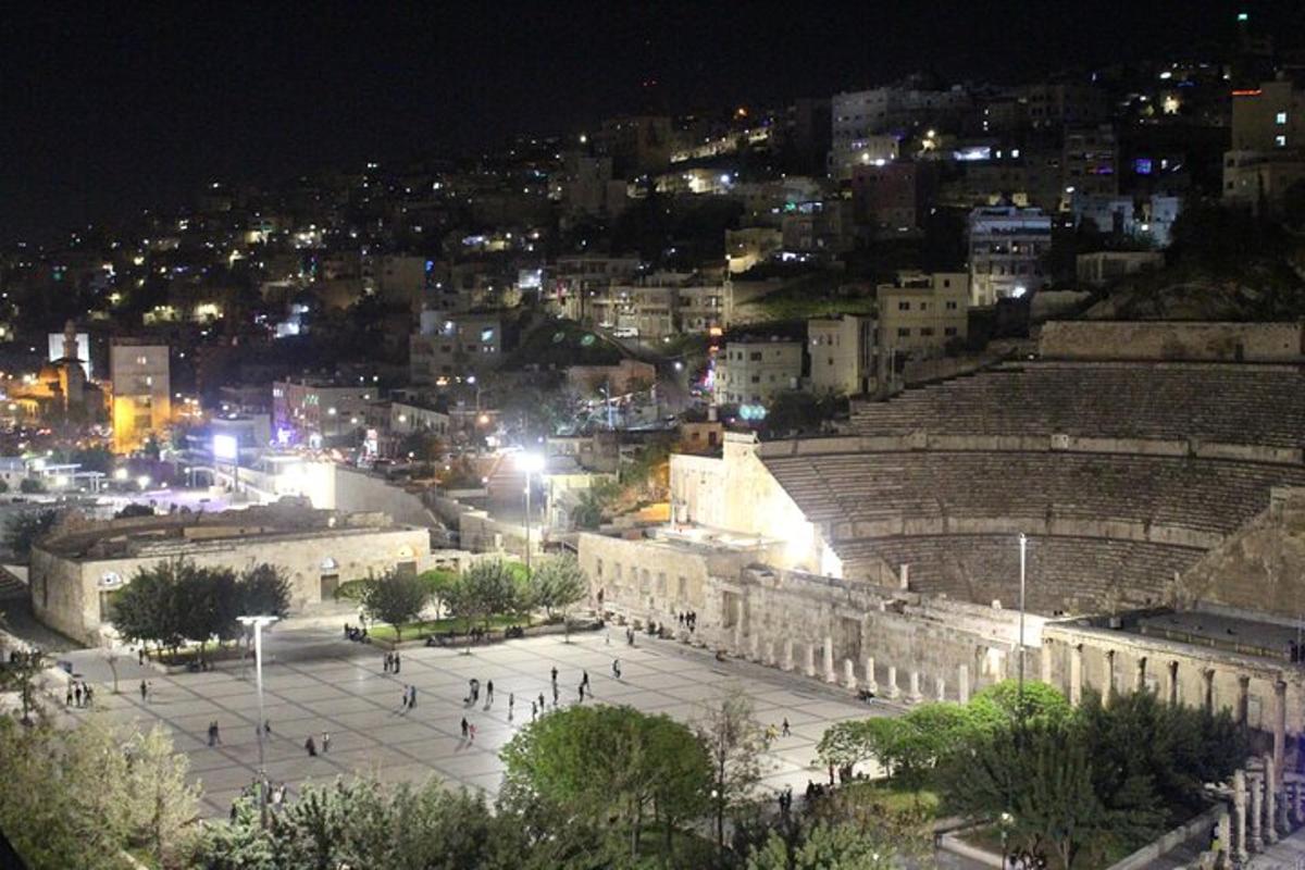 a view of a city at night with lights