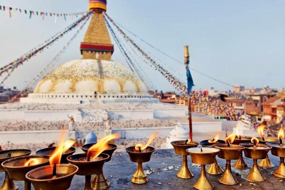 a group of candles in front of a large building