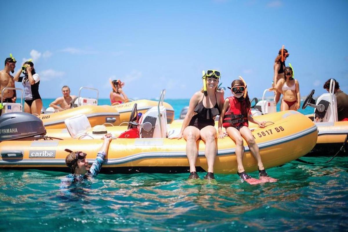 a group of people sitting on a raft in the water