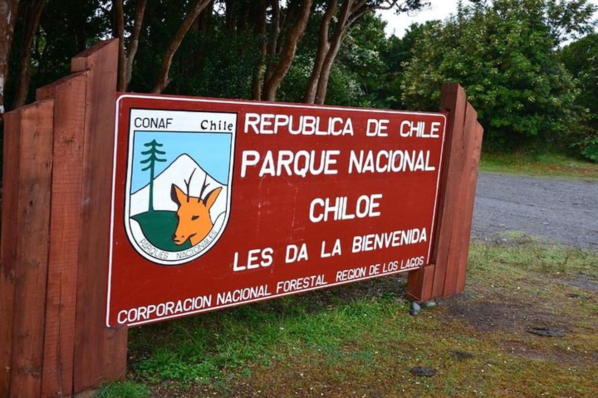 a sign for a parrot macaque macaque village