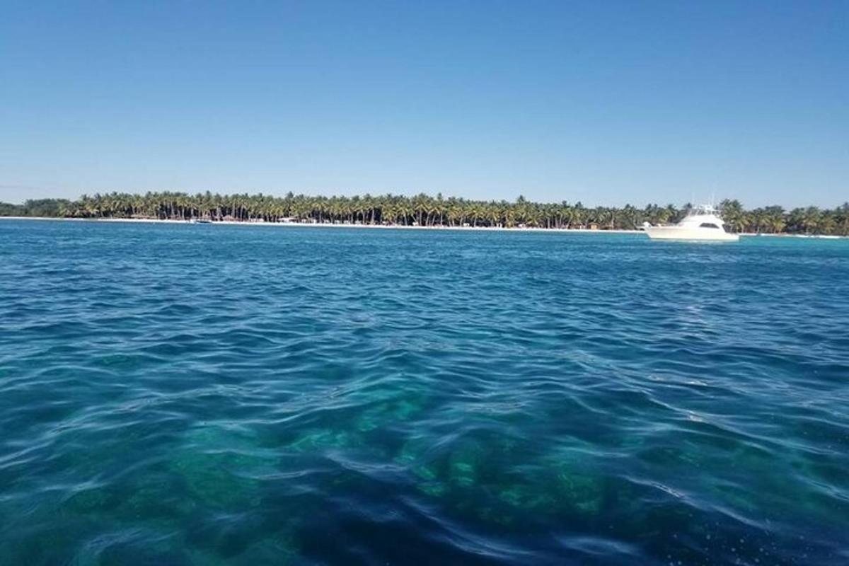 a boat in the middle of a large body of water