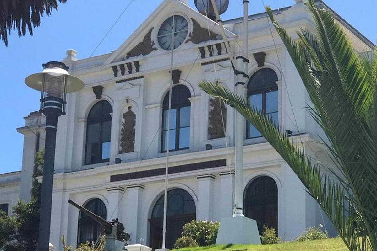 a large white building with a clock on it