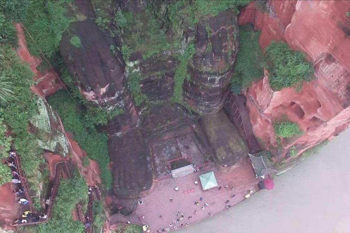 an overhead view of an old building with a car parked