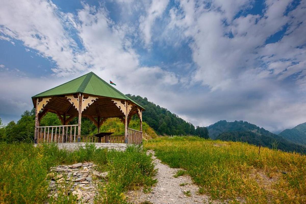 a gazebo in the middle of a field