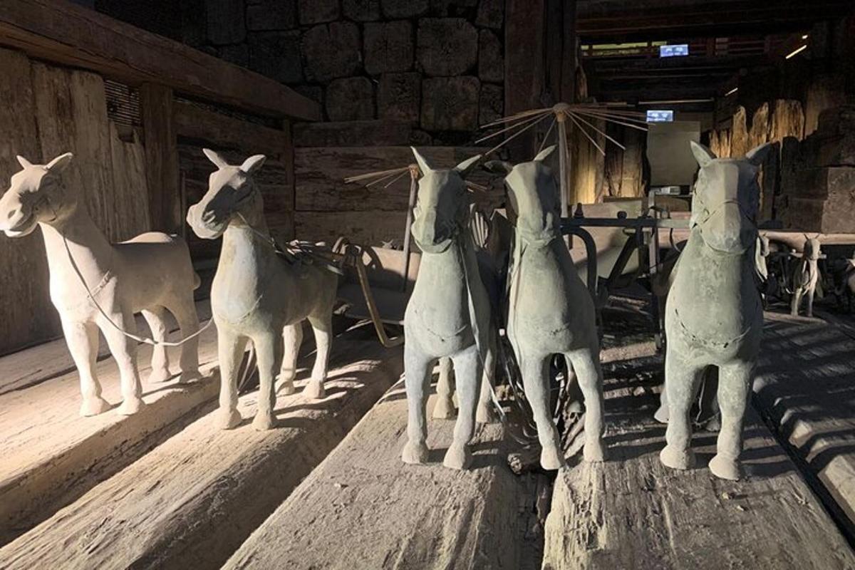 a group of statues of sheep standing in a room