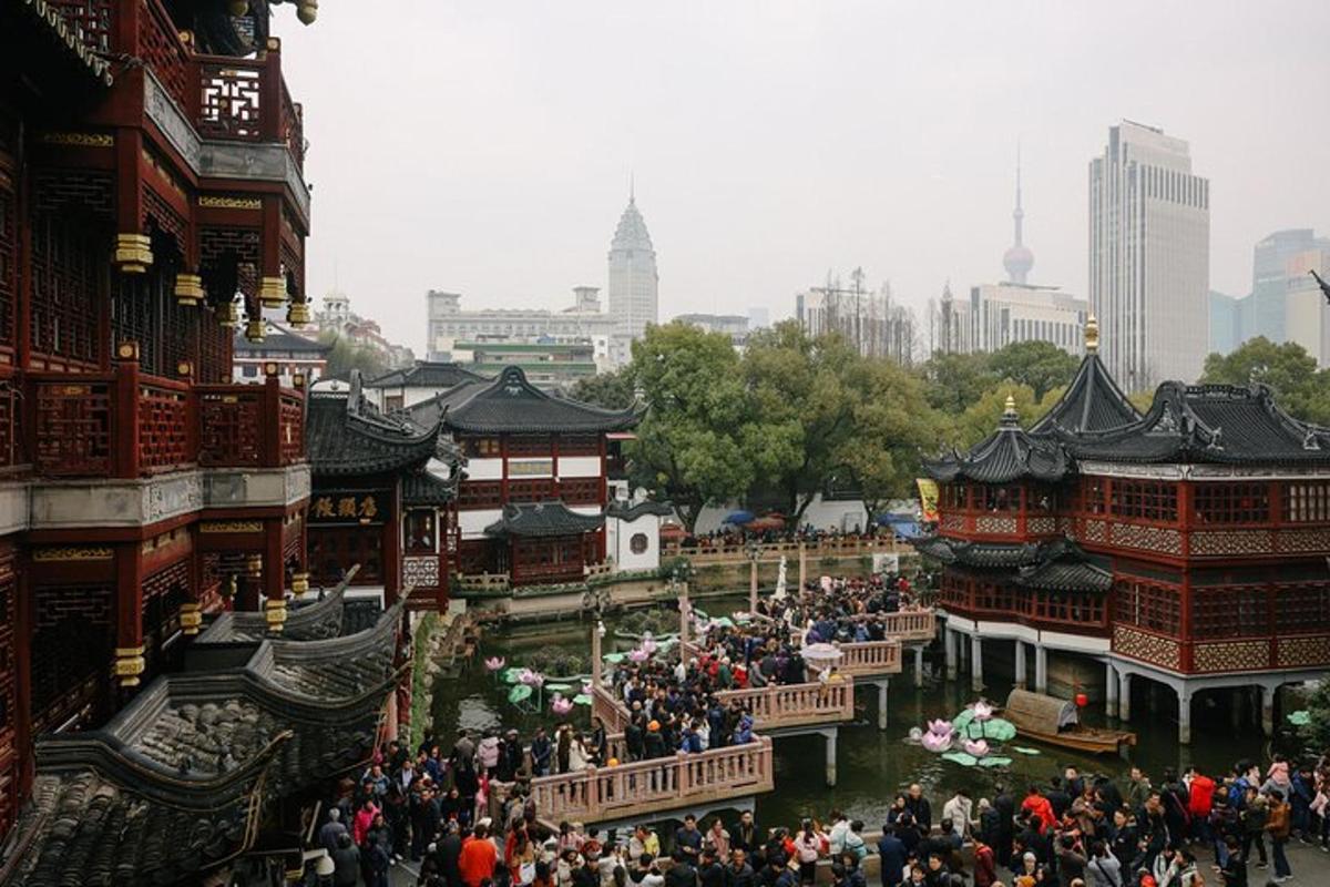 a large crowd of people standing in front of buildings