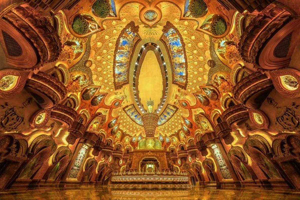 a room with a large mirror on the ceiling