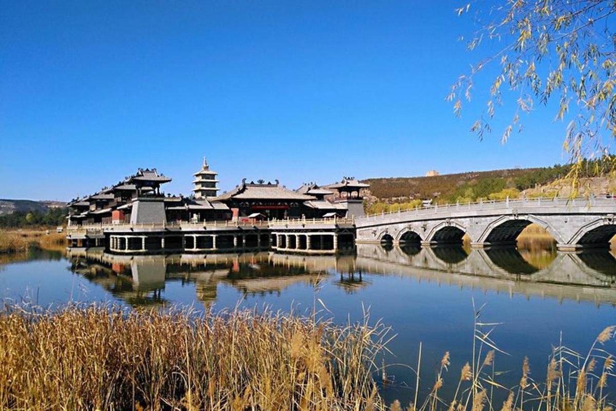 a bridge over a river with buildings on it