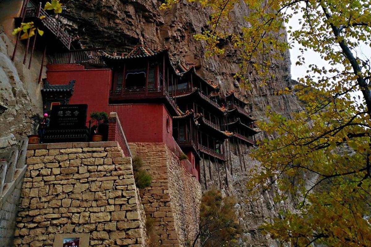 a building on the side of a mountain