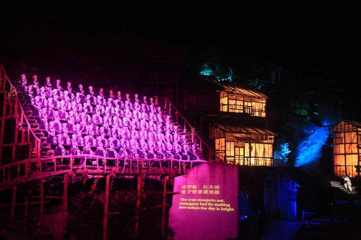 a building with purple lights on it at night