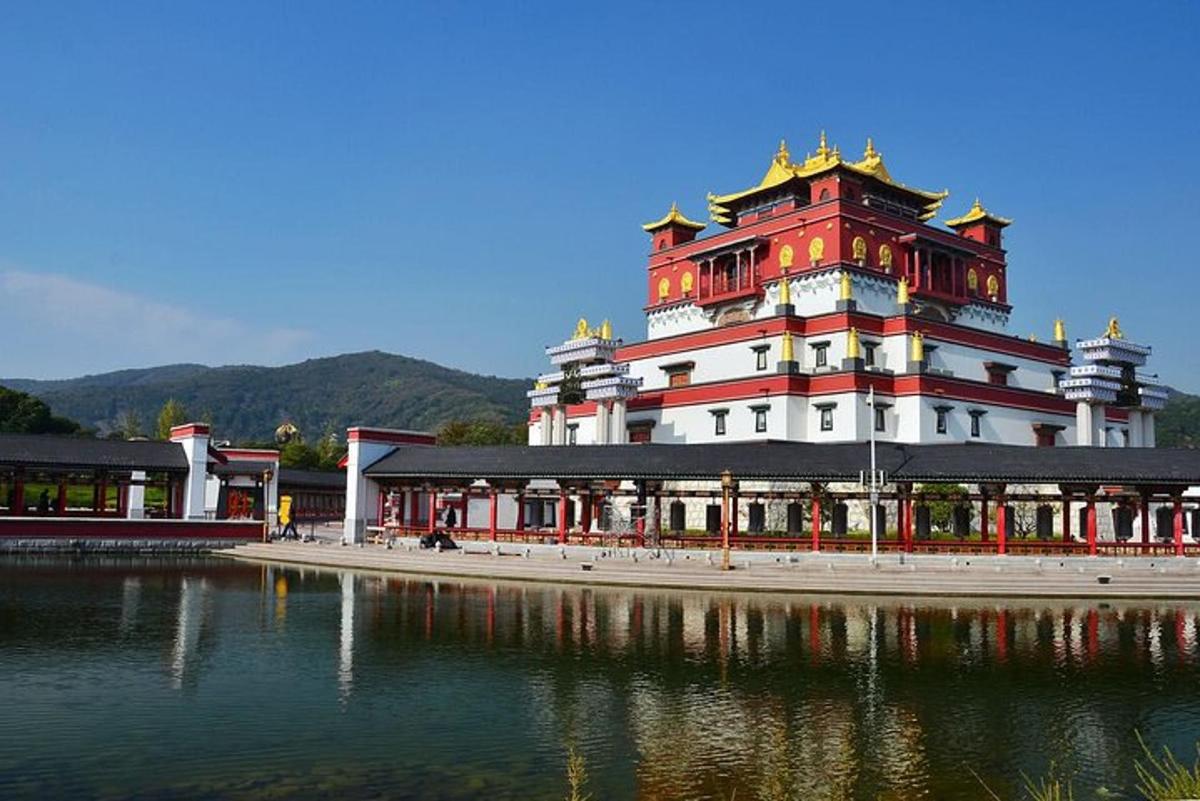 a large building next to a body of water