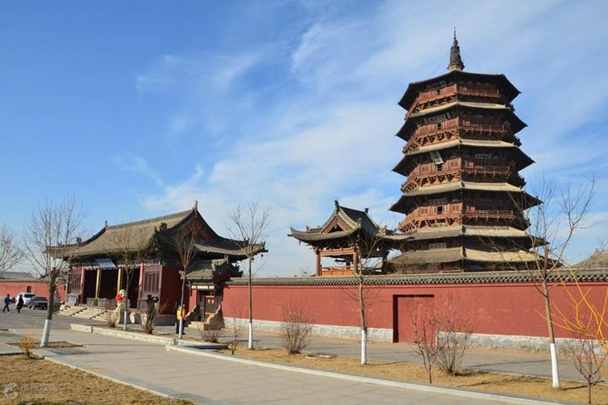 a large building with a large tower on the side of it