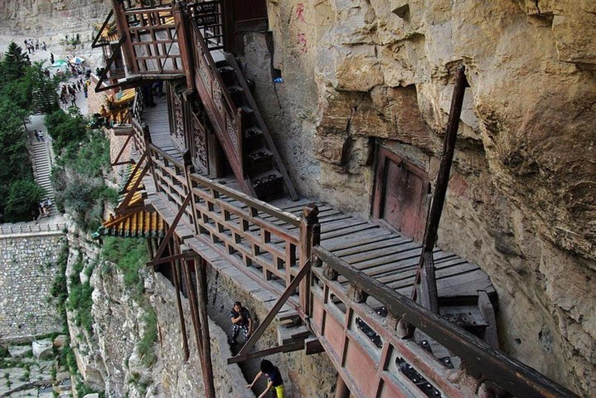 an overhead view of a staircase on a mountain
