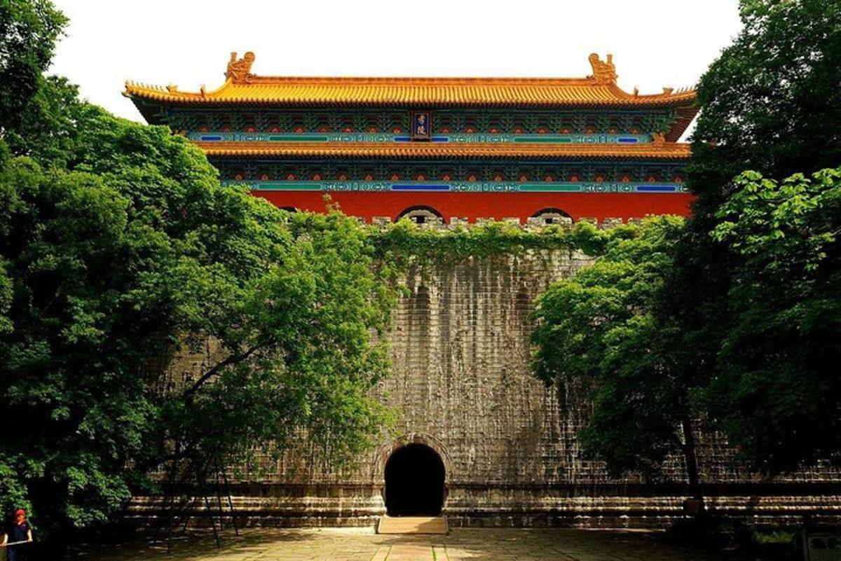 a building with a doorway in front of a wall