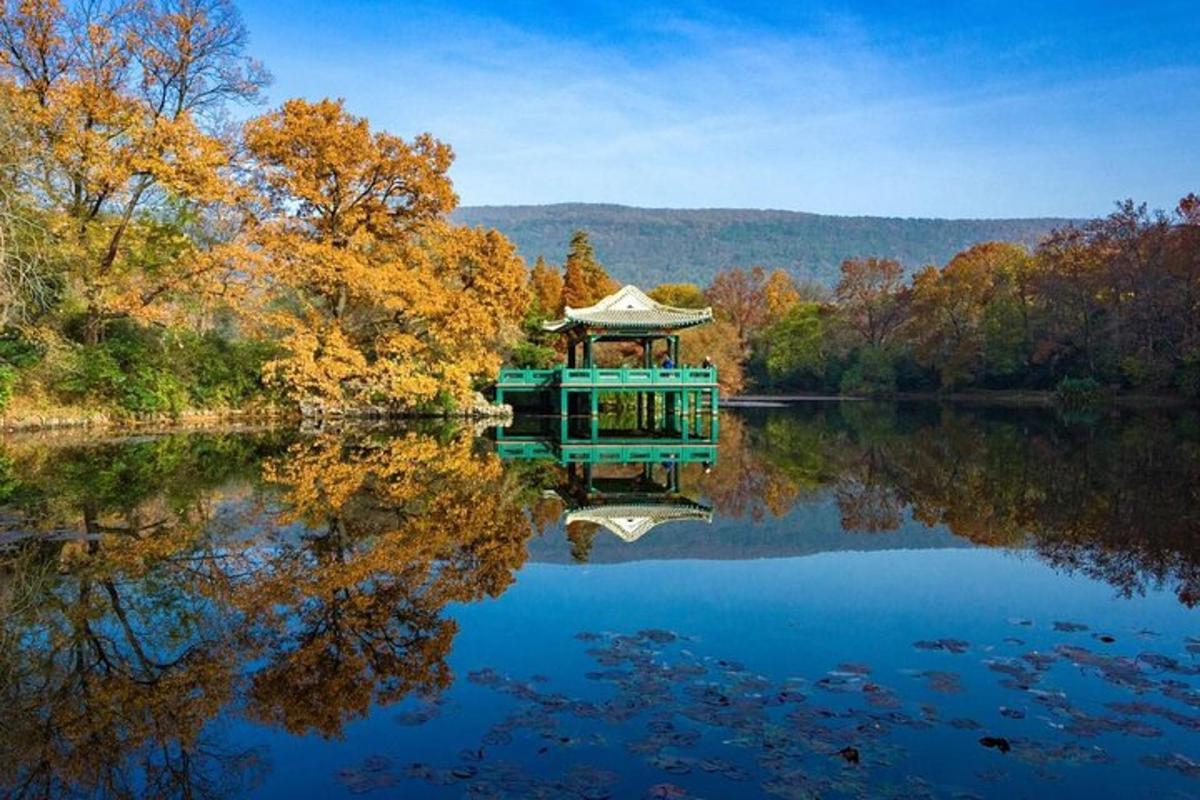 a pagoda in the middle of a lake