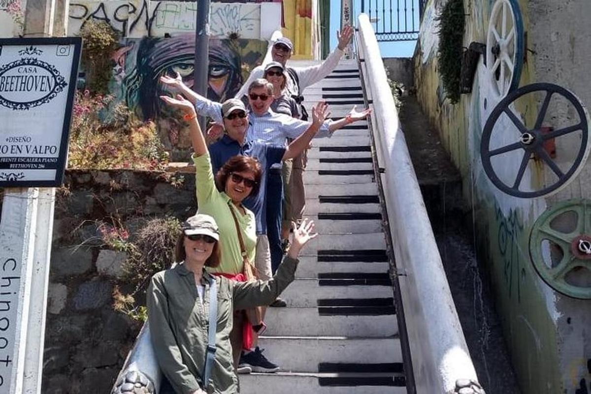 a group of people climbing up some stairs