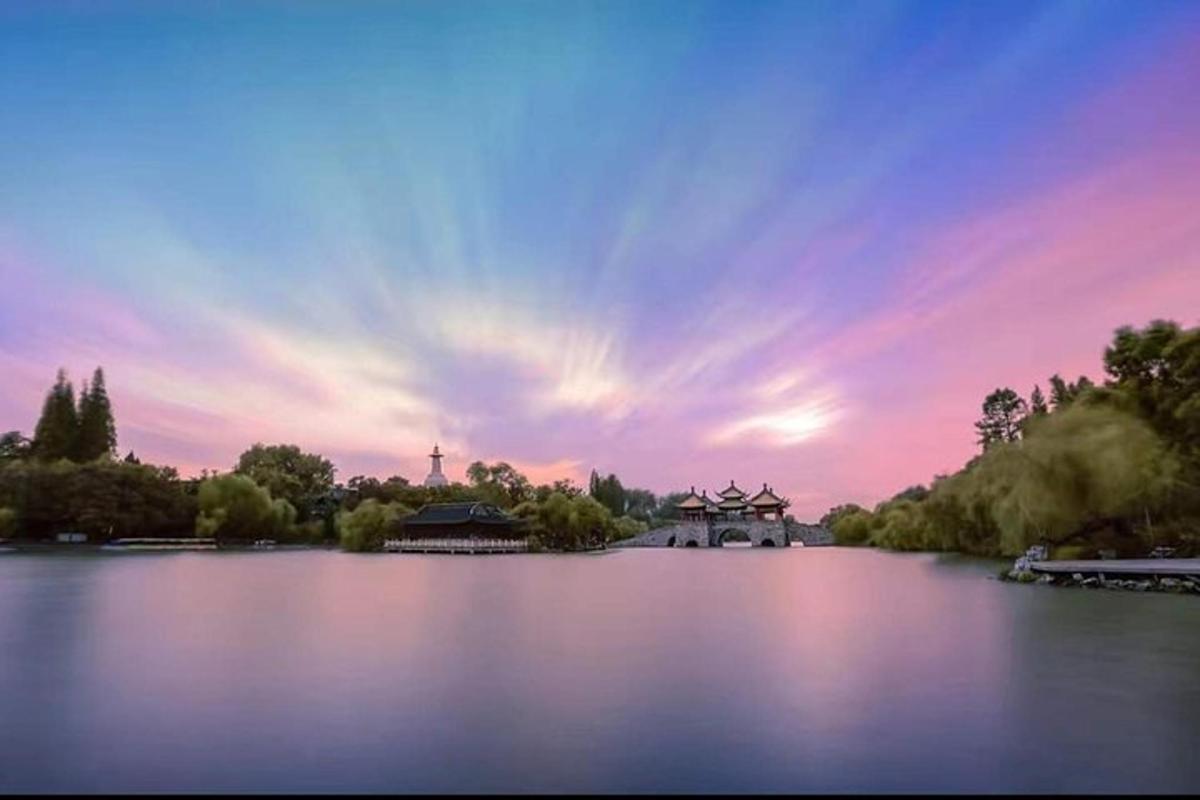 a view of a large lake at sunset
