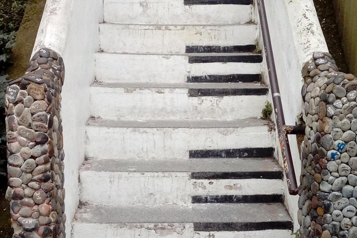 a group of stairs with rocks on them