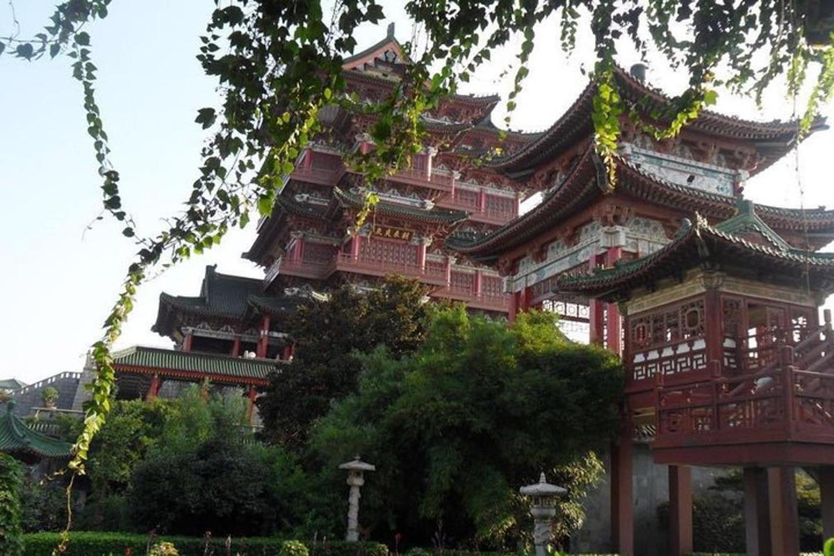 a large building with a tower in front of it