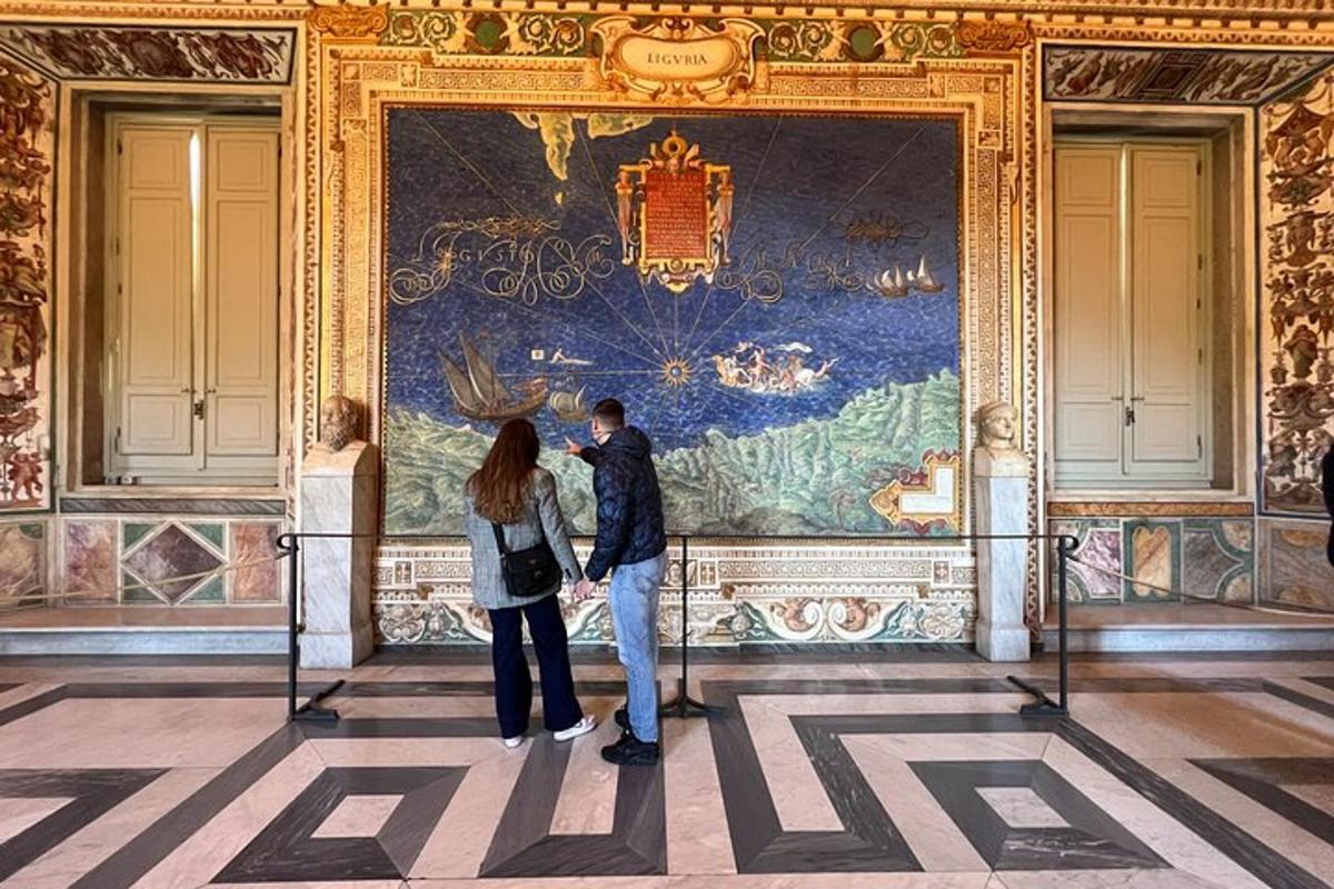 a man and a woman standing in front of a large wall