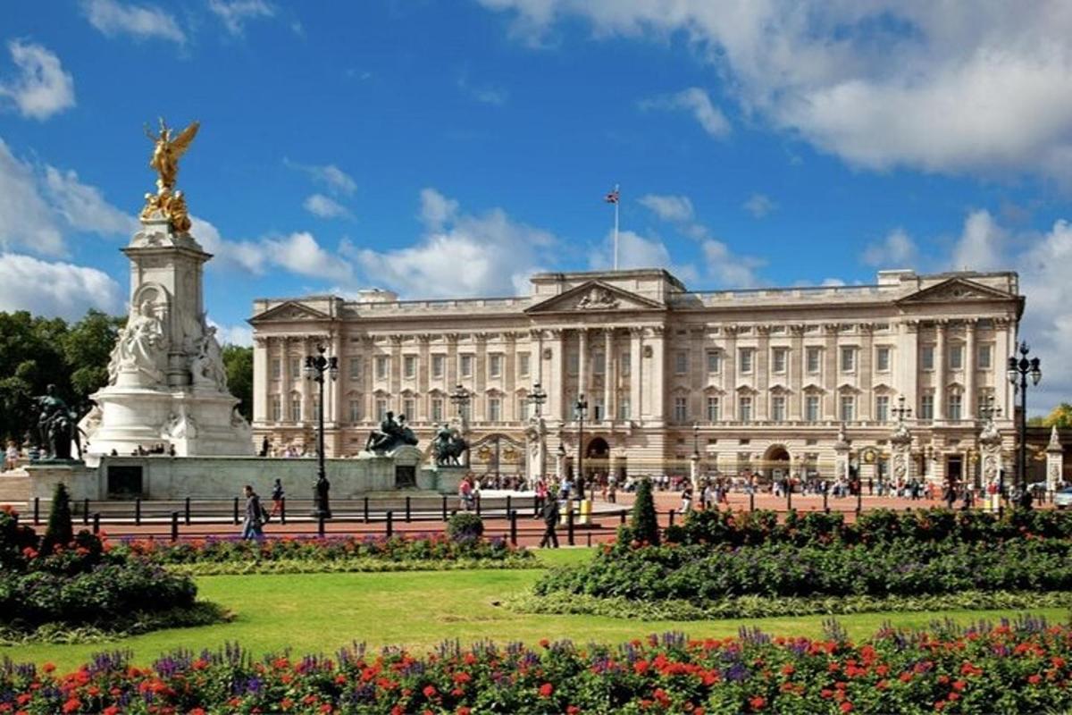 a large building with a statue in front of it