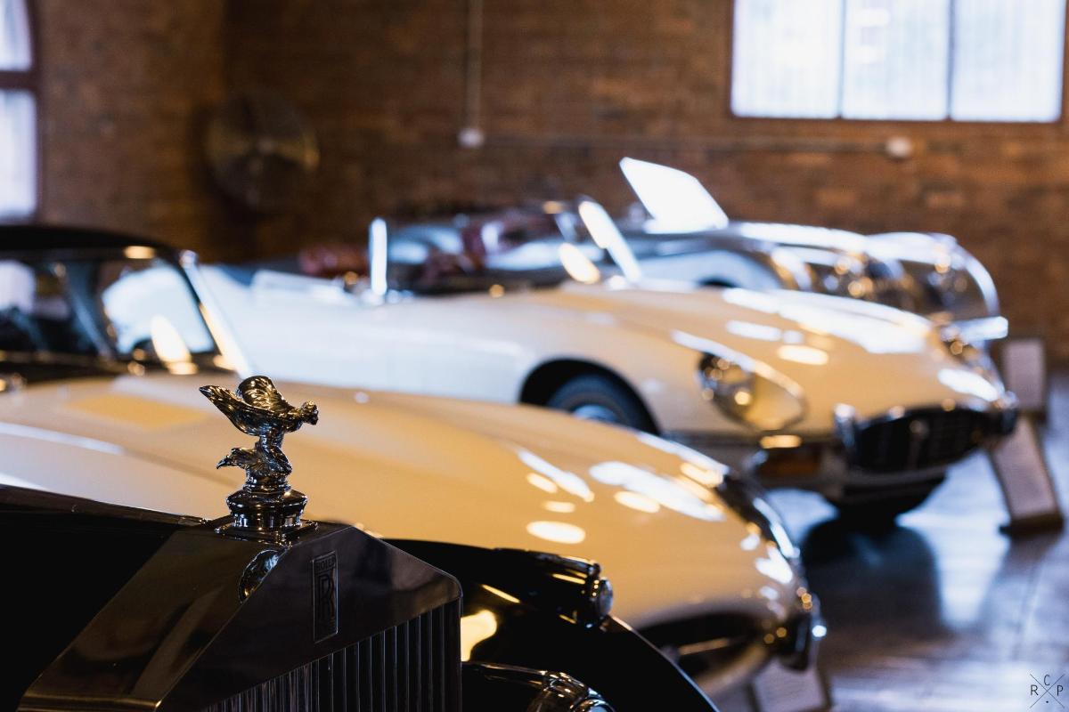 a row of parked cars parked in a garage