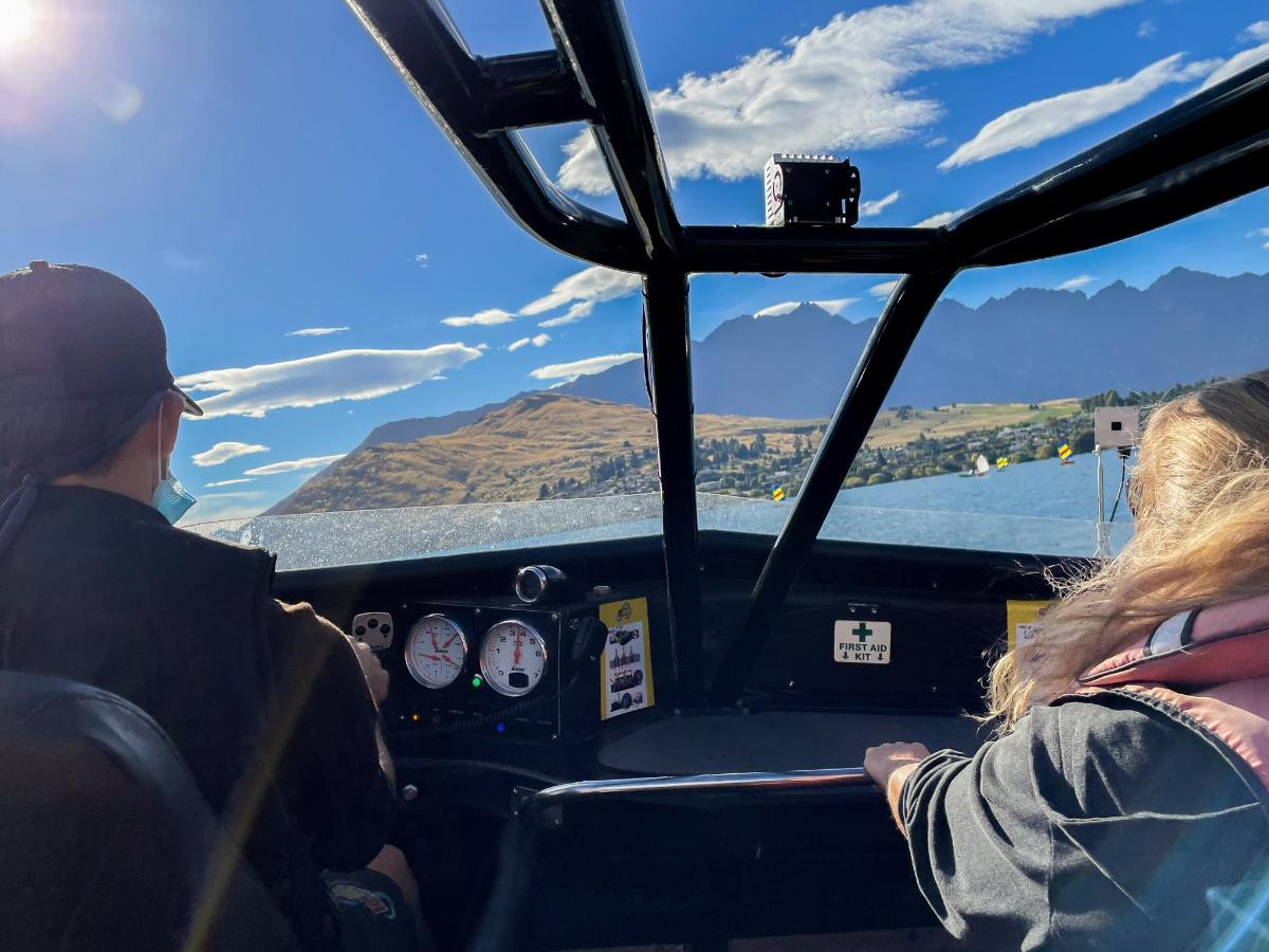 a man and woman sitting in the cockpit of an airplane