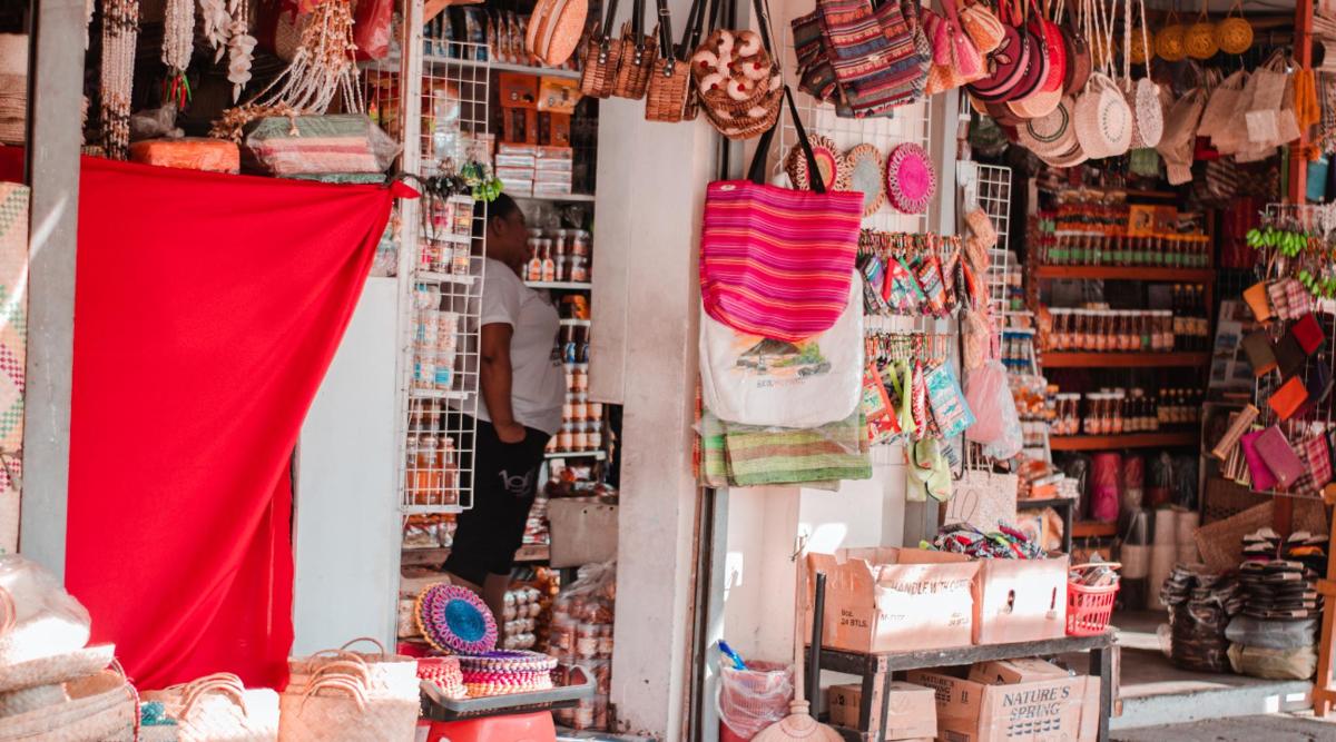a store with red cloths and other items on display