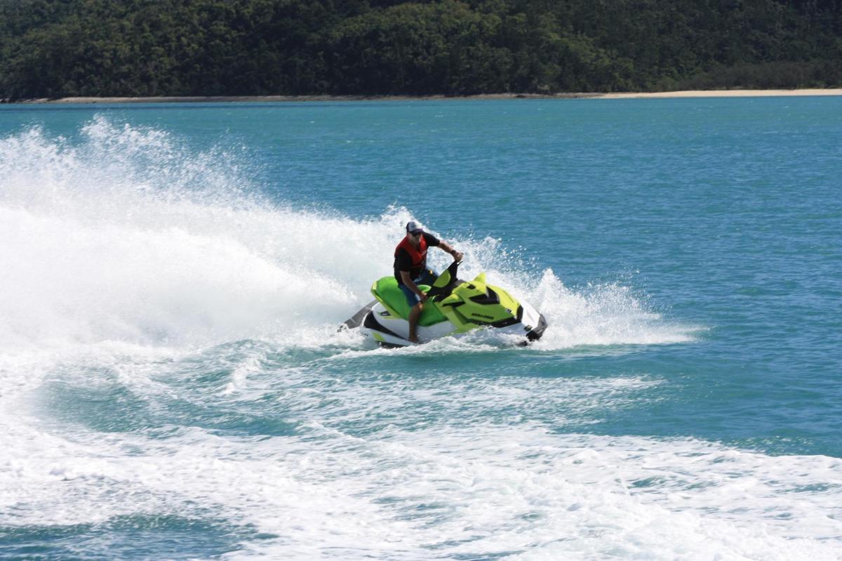 a man on a jet ski in the water