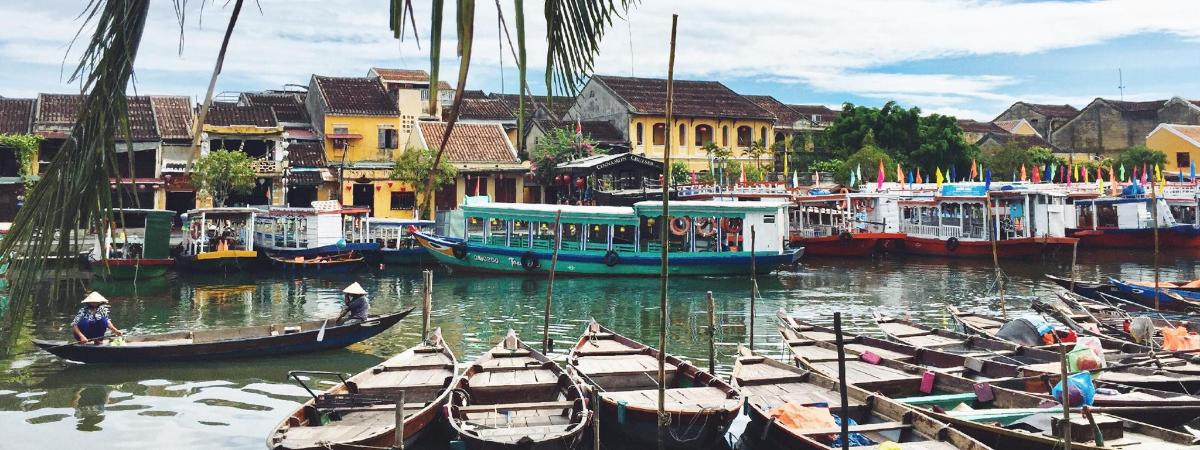a group of boats are docked in a harbor