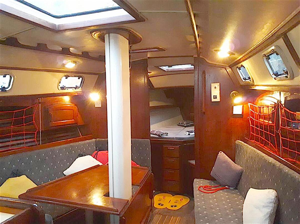 a view of the inside of a train room with a table