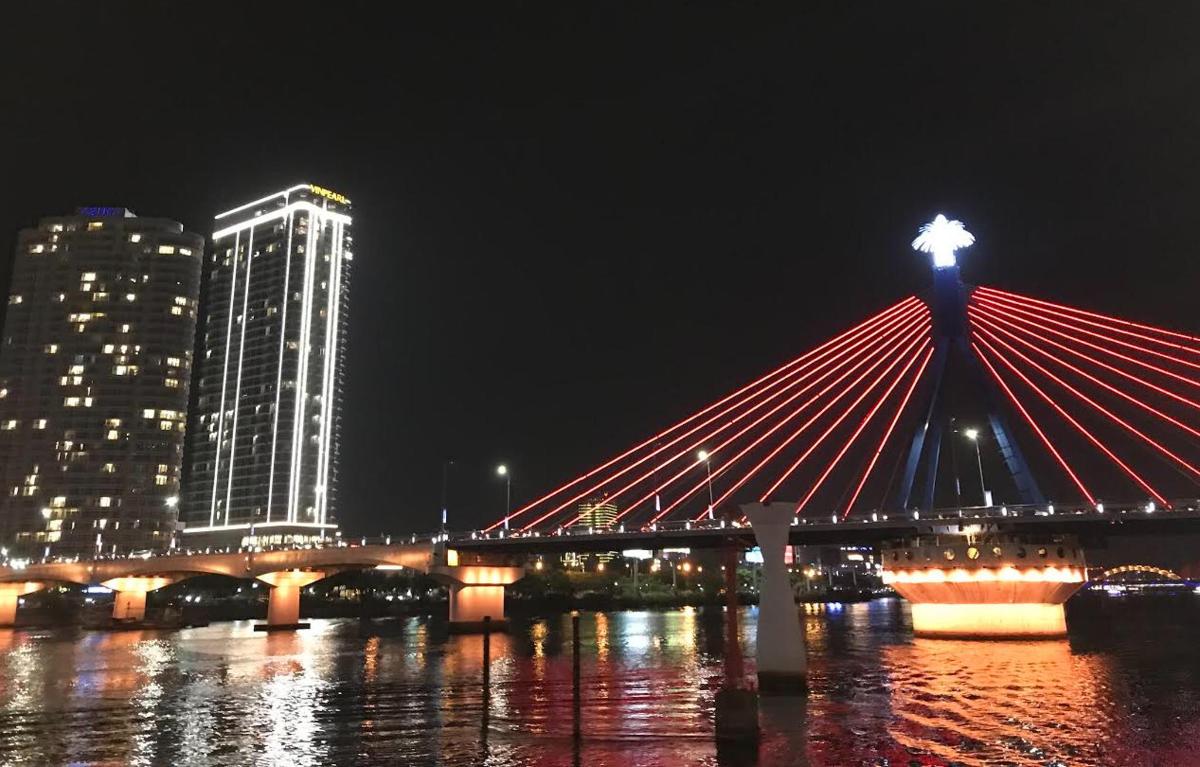a bridge over a body of water at night