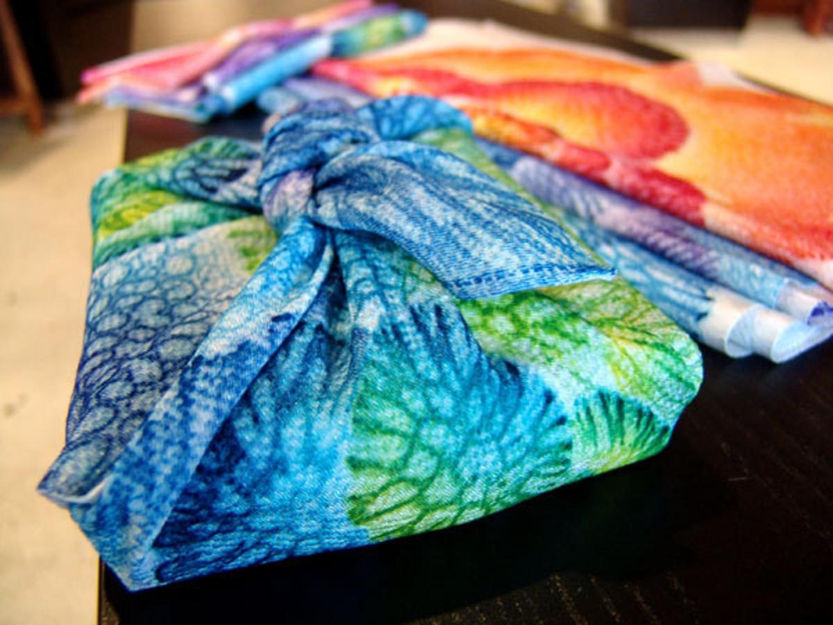 a pile of blankets sitting on top of a table