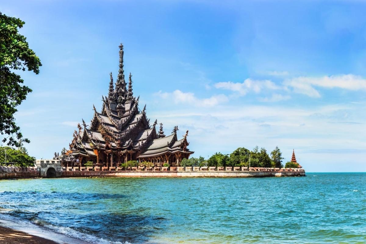 a large building in the middle of the water