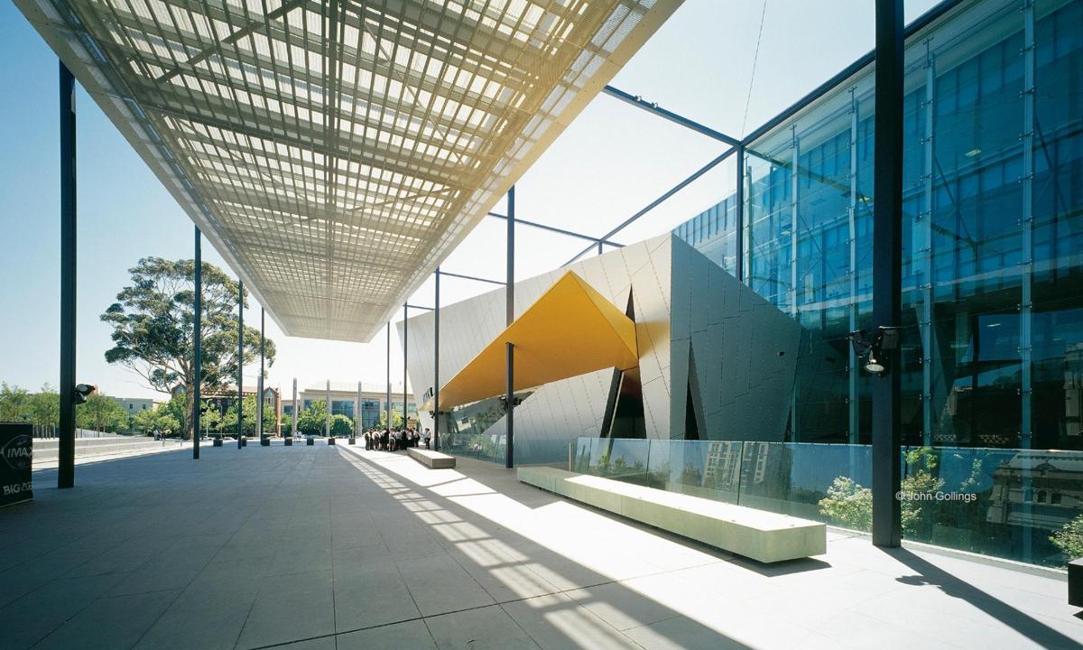 an external view of a building with a glass facade