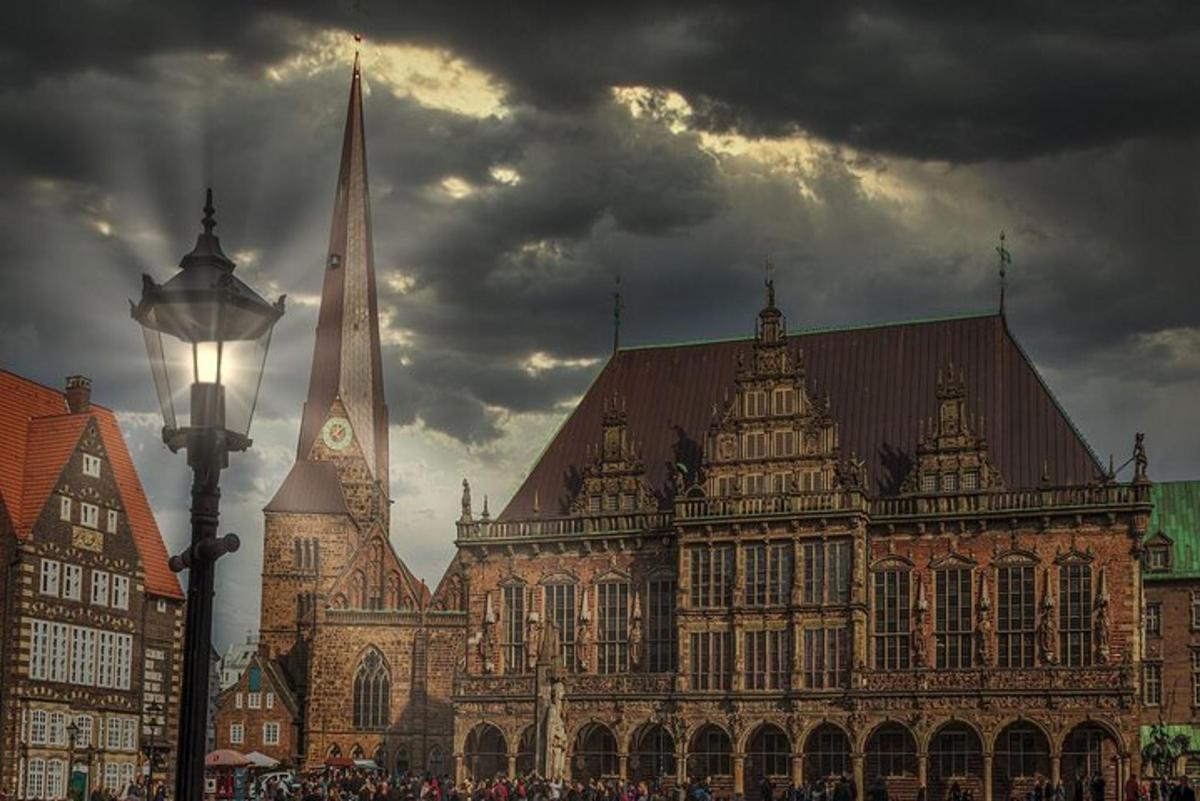a large building with a clock tower and a church