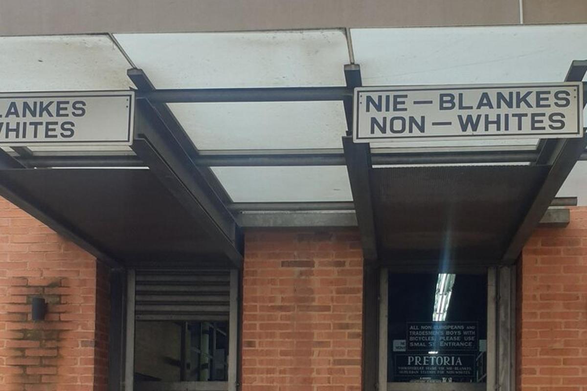 a building with a sign that reads ne blazes and non whites
