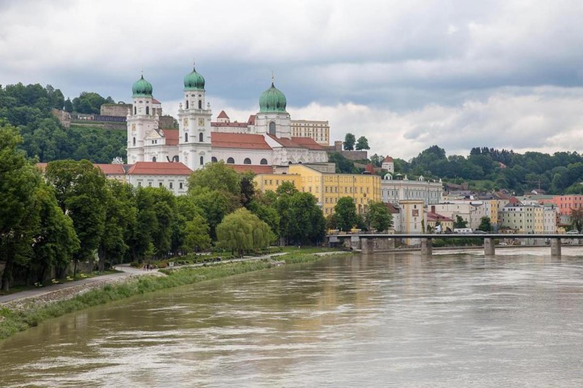 a view of a river with a bridge and buildings