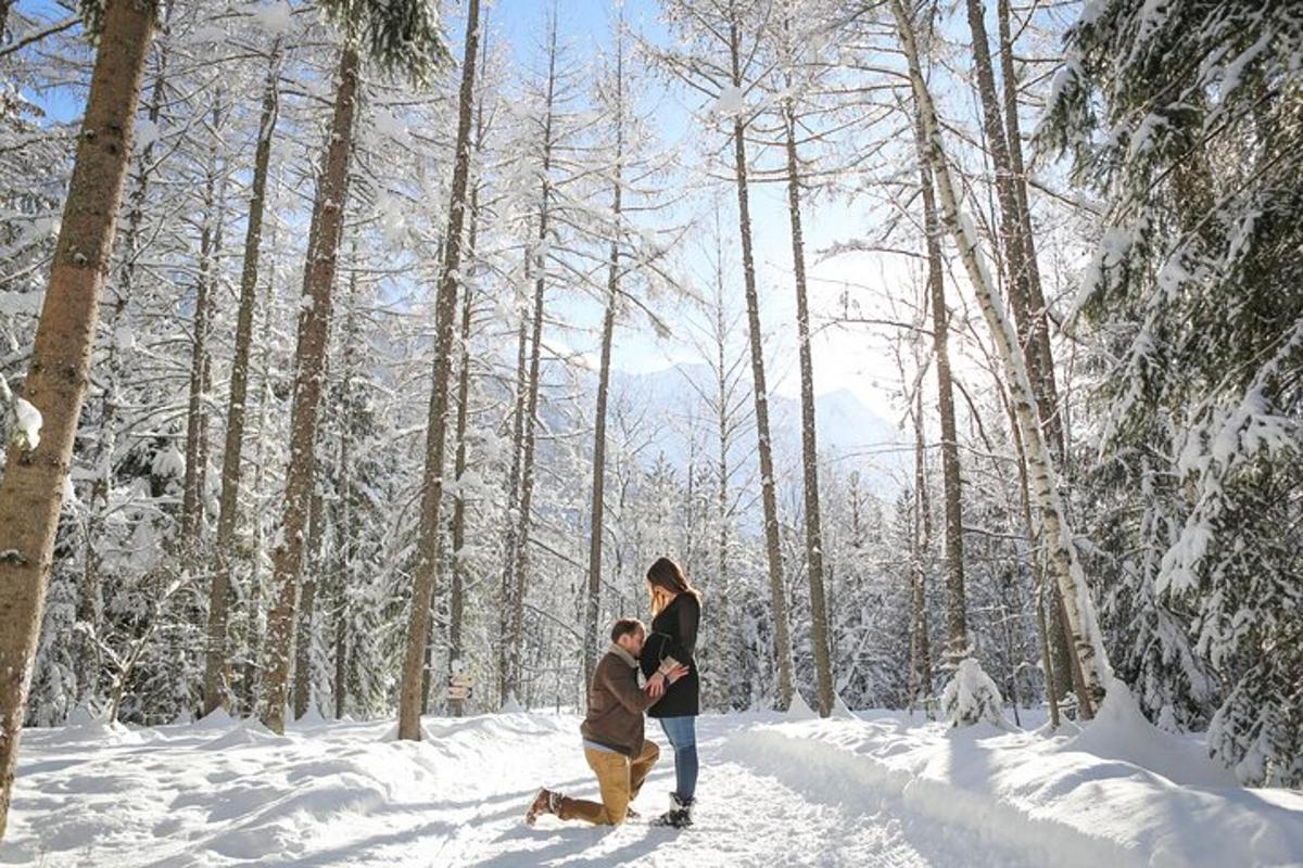 a woman and a child walking in the snow