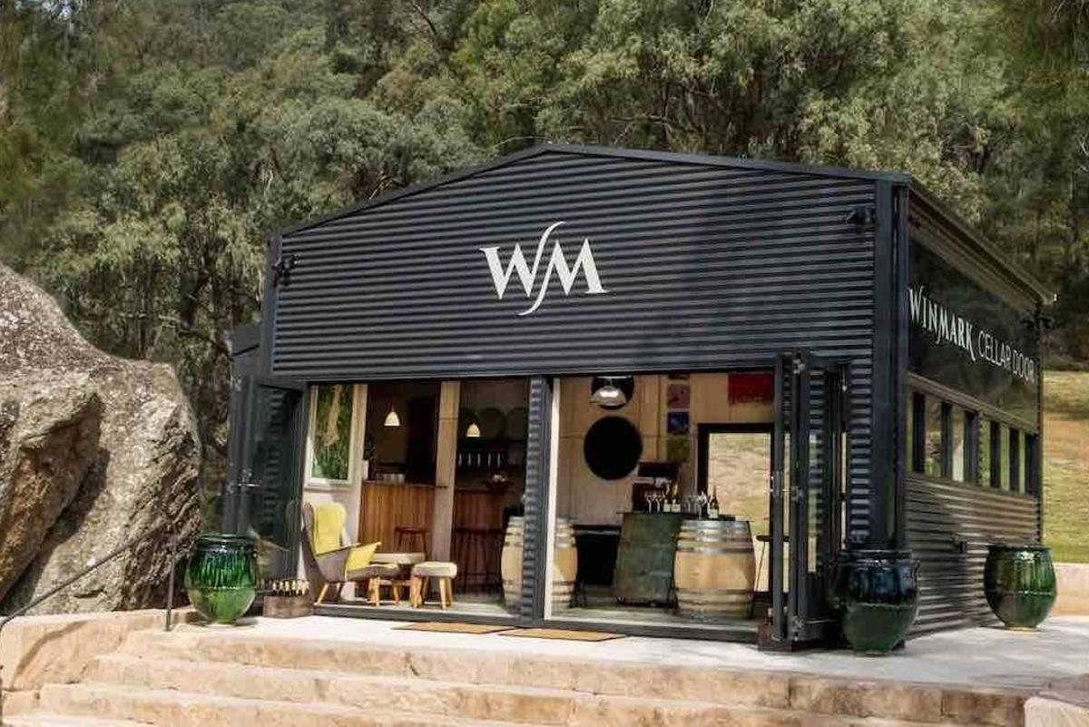 a black building with a wii sign on it