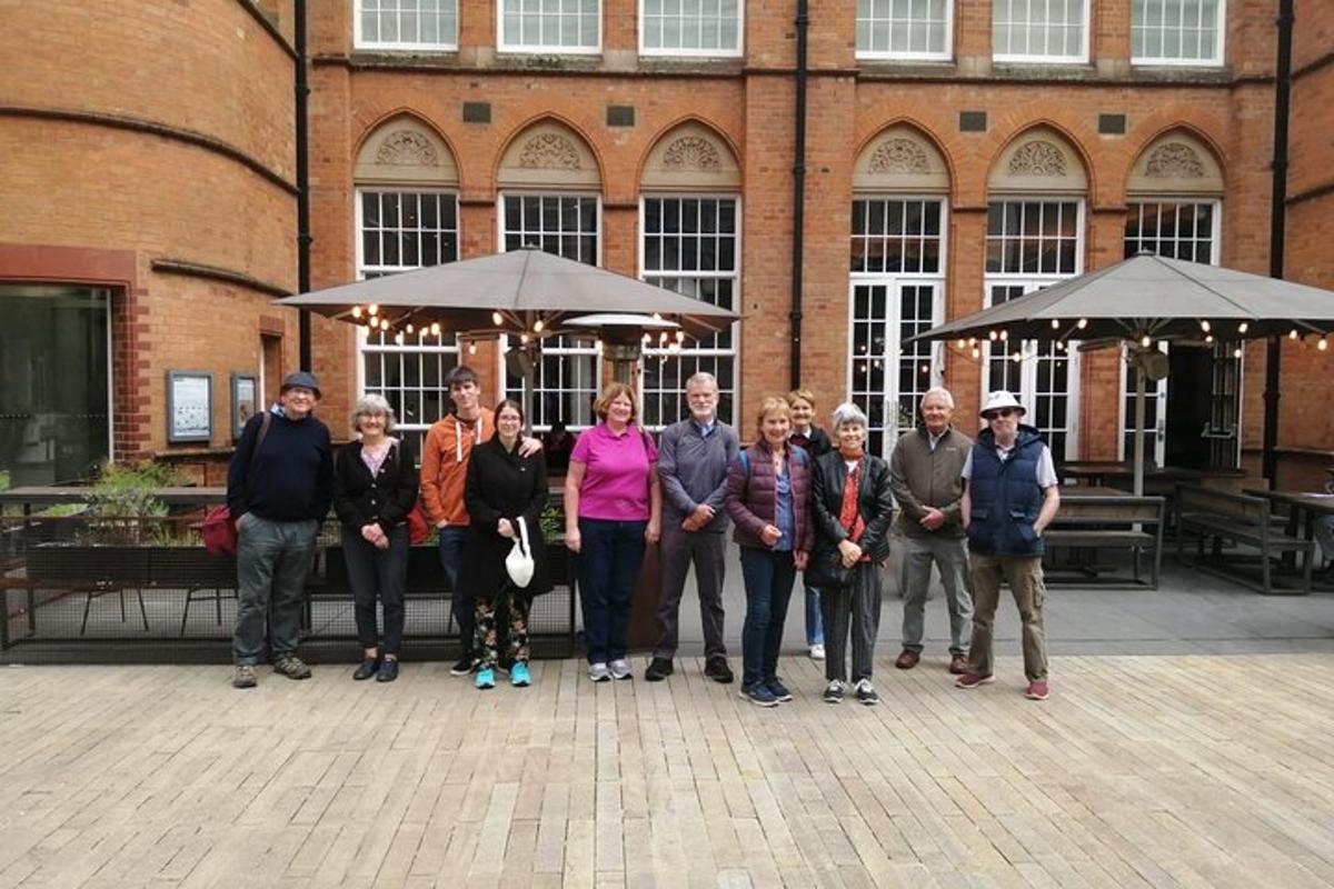 a group of people standing in front of a building