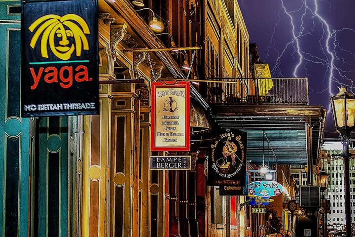 a group of signs on the side of a building with lightning