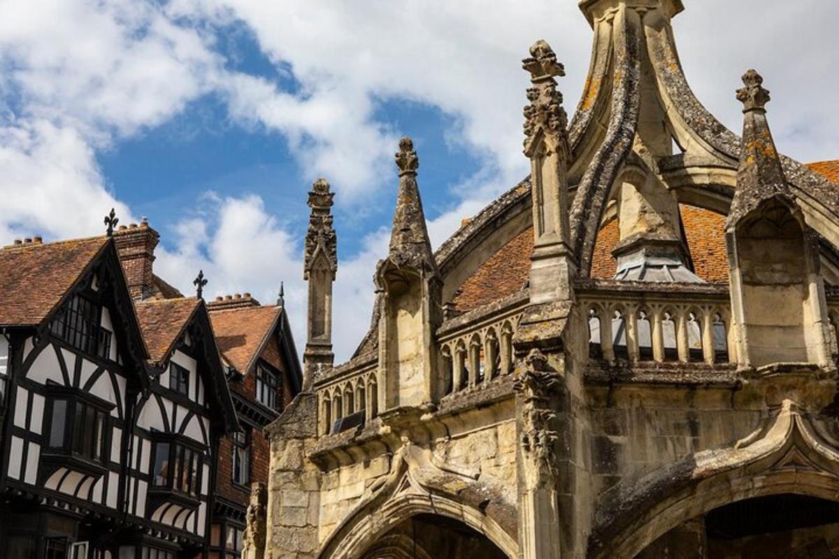 an old building with an arch and a roof