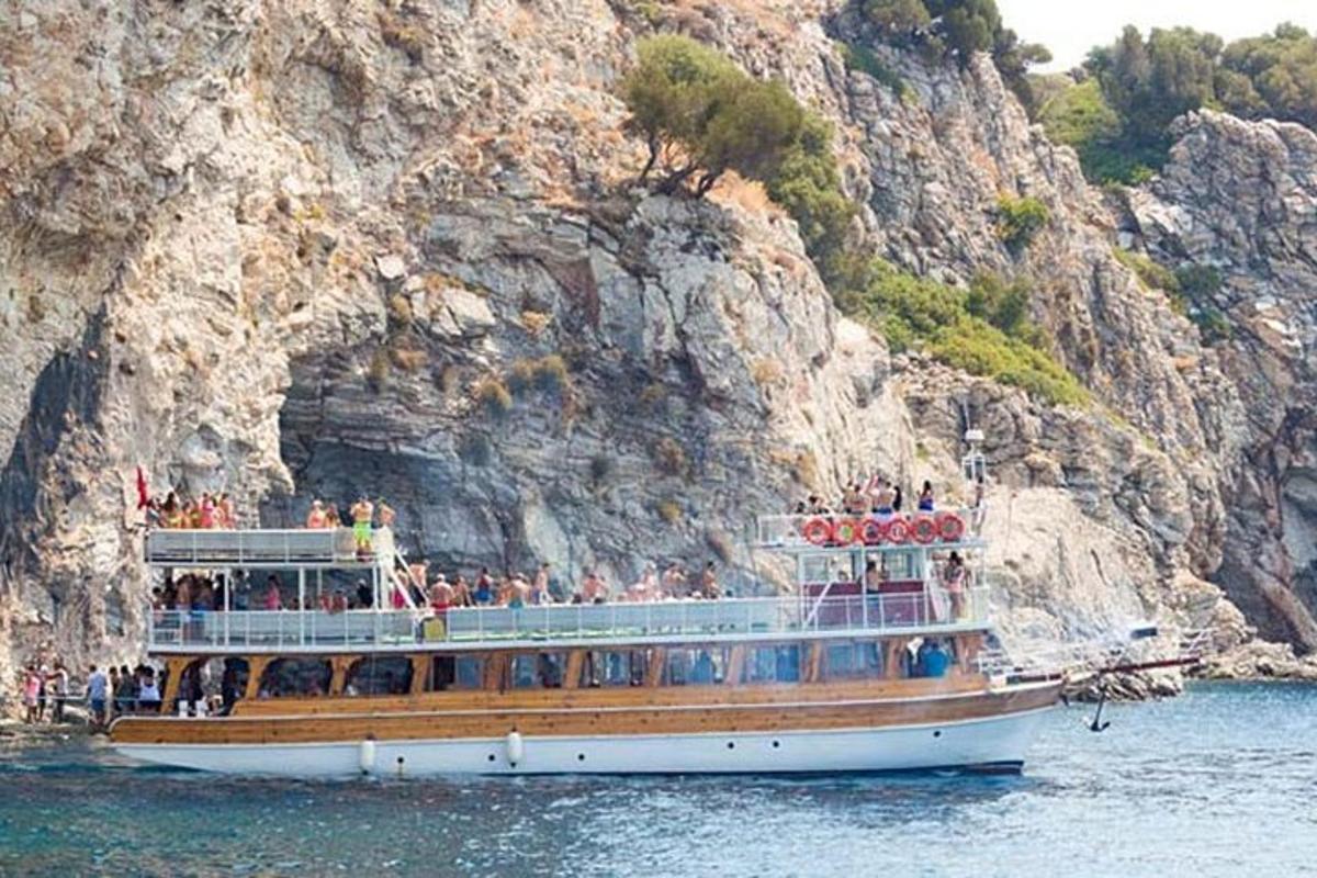 a group of people on a boat in the water