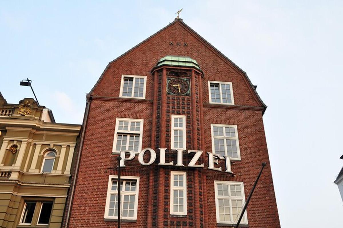 a tall brick building with a clock tower on it