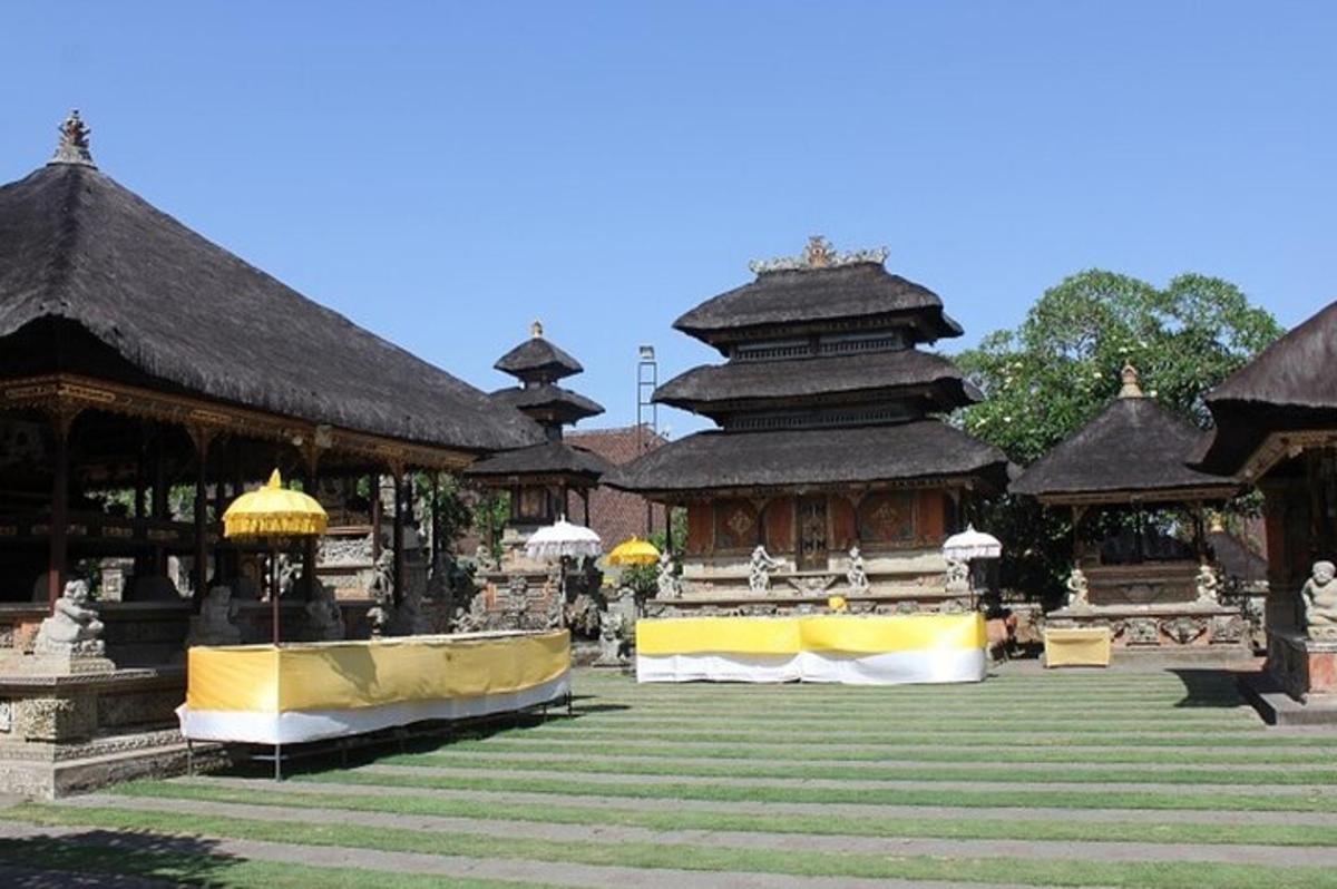 a group of buildings with yellow and black roofs