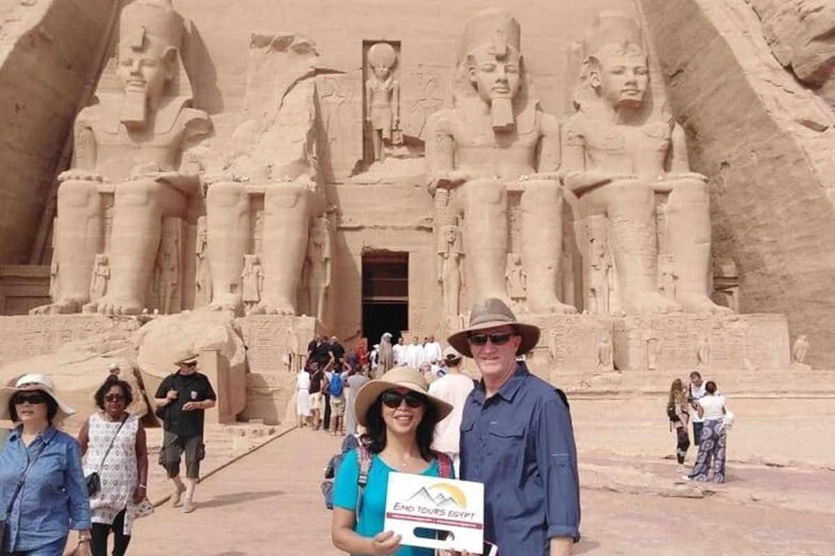 a man and a woman standing in front of thearaoharaoh