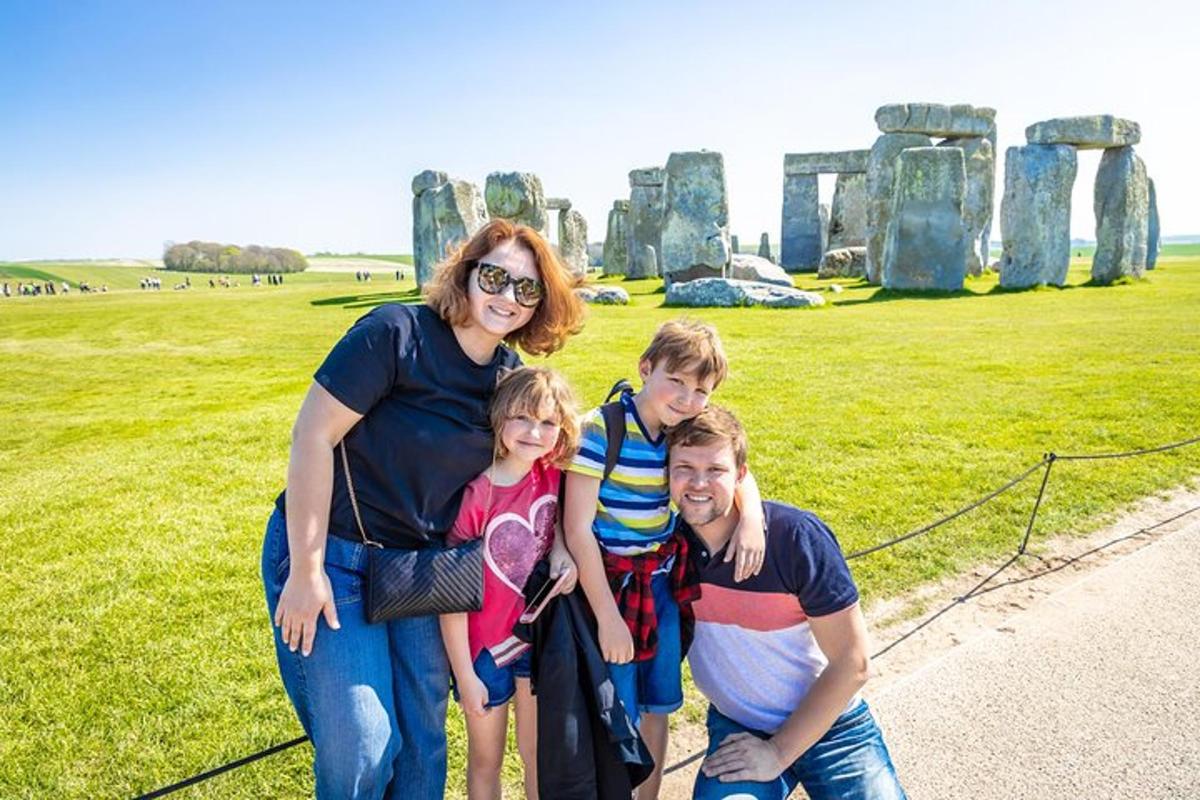a woman and her two children posing for a picture in front ofatheredatheredathered