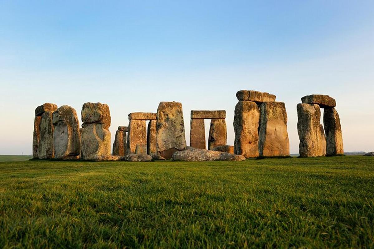 an image of stonehenge in a field of grass