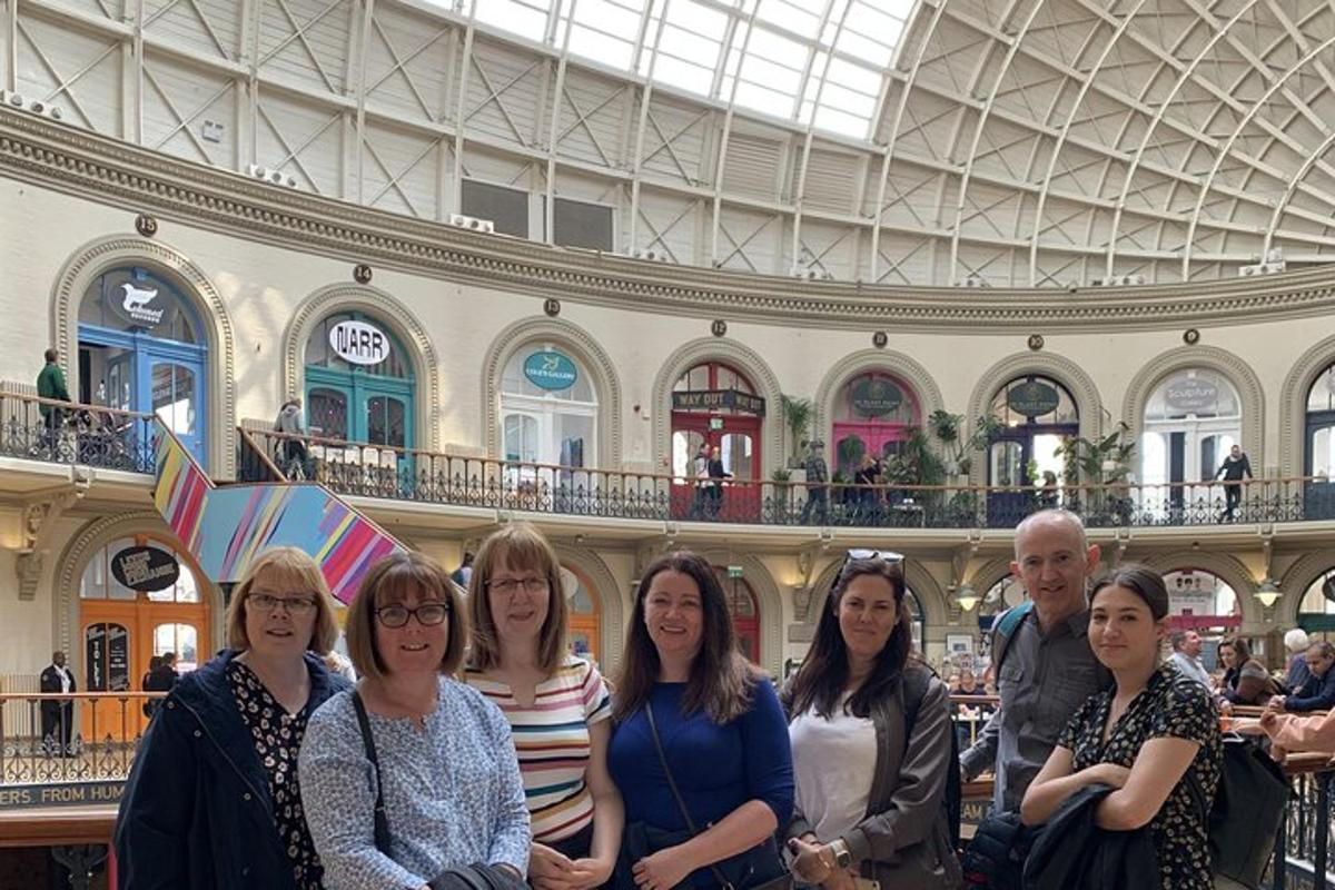 a group of people standing in a building